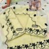 Light yellow muslin embroidery Punjabi suit with black floral embroidery and dupatta